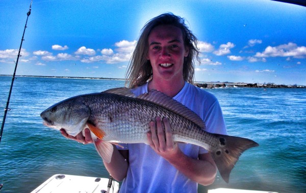 Dillon with his first Red Drum