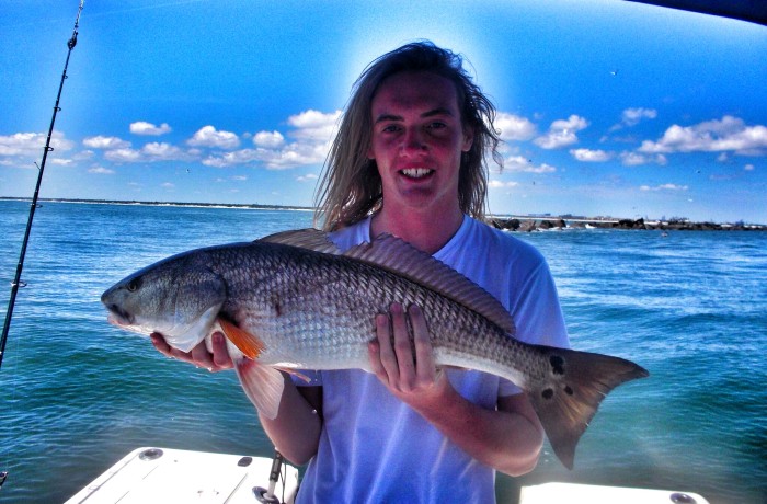 Dillon with his first Red Drum
