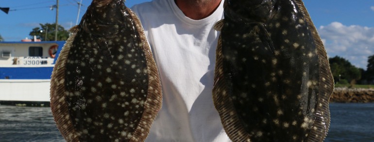 Jonathan Clark with a couple of stuf Flounder