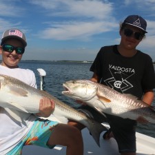 Young anglers with the victory pose