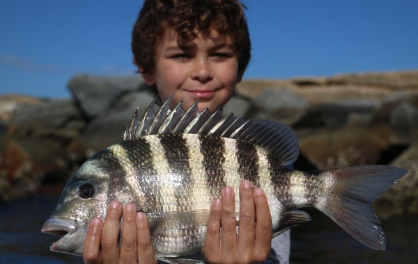 Another youth angler with a victory shot