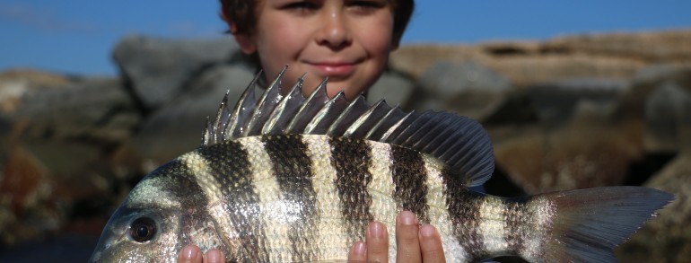Another youth angler with a victory shot