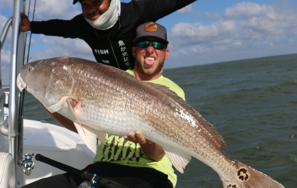 Wess Reeder and Monster Mike with a gnarly Bull Red