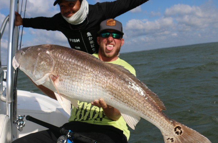 Wess Reeder and Monster Mike with a gnarly Bull Red
