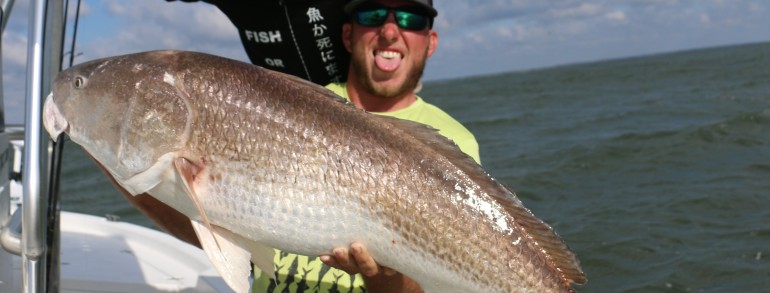 Wess Reeder and Monster Mike with a gnarly Bull Red