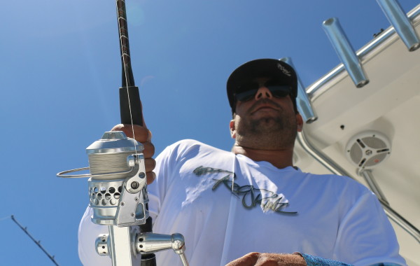 Chris of Reel Skins Fishing Apparel doing work with the Accurate Twin Spin