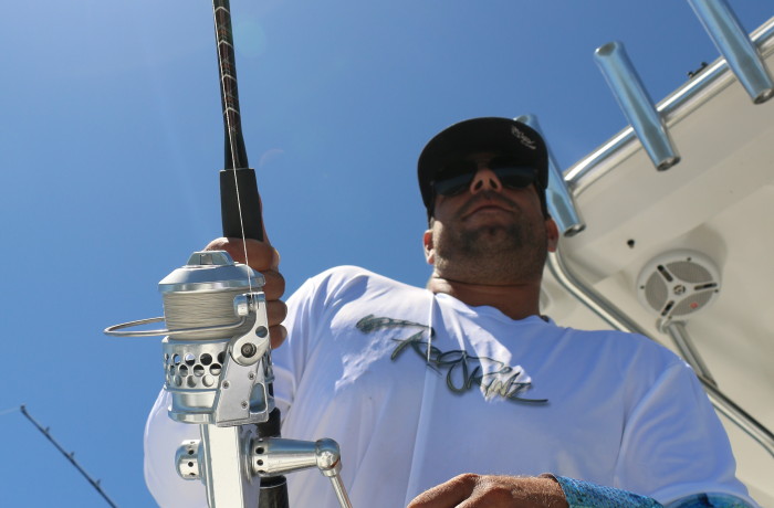 Chris of Reel Skins Fishing Apparel doing work with the Accurate Twin Spin