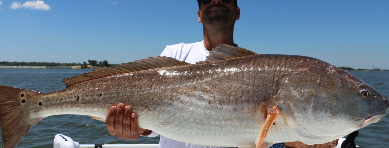 Chris of Reel Skins Fishing Apparel struggling with gravity