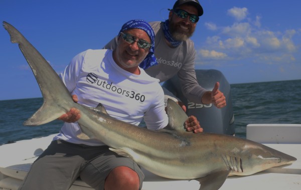 Here’s Jim Cantore of the Weather Channel with a large Black Tip Shark
