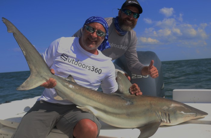 Here’s Jim Cantore of the Weather Channel with a large Black Tip Shark