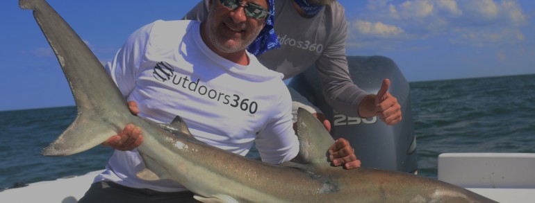 Here’s Jim Cantore of the Weather Channel with a large Black Tip Shark