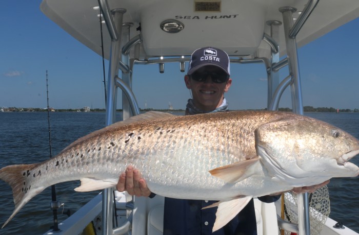Miles with a giant Bull Red