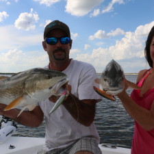 Jonathan and Sabrina Clark with a set of twins caught on Rapala XRaps