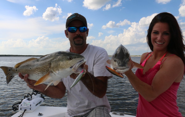 Jonathan and Sabrina Clark with a set of twins caught on Rapala XRaps