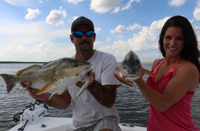 Jonathan and Sabrina Clark with a set of twins caught on Rapala XRaps