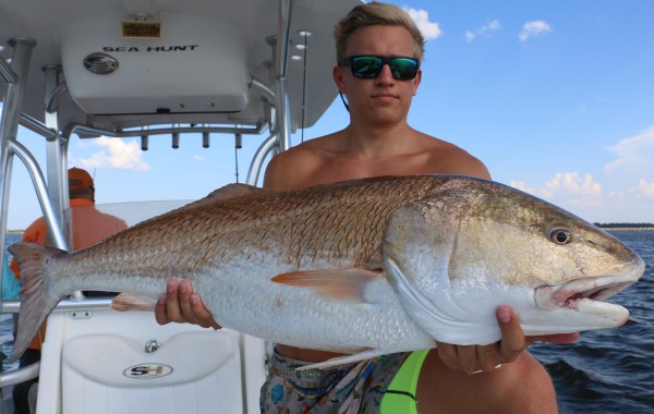 Madison Stephens with a River Monster