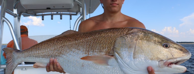 Madison Stephens with a River Monster