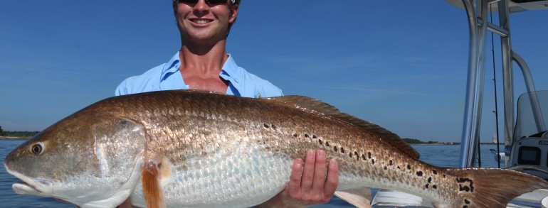 Hunter Dance, grandson to the legendary Bill Dance with a Giant Bull