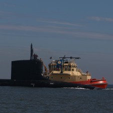 Navy submarine coming through Mayport Inlet
