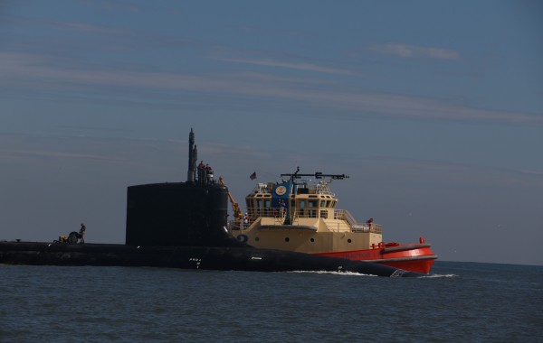 Navy submarine coming through Mayport Inlet