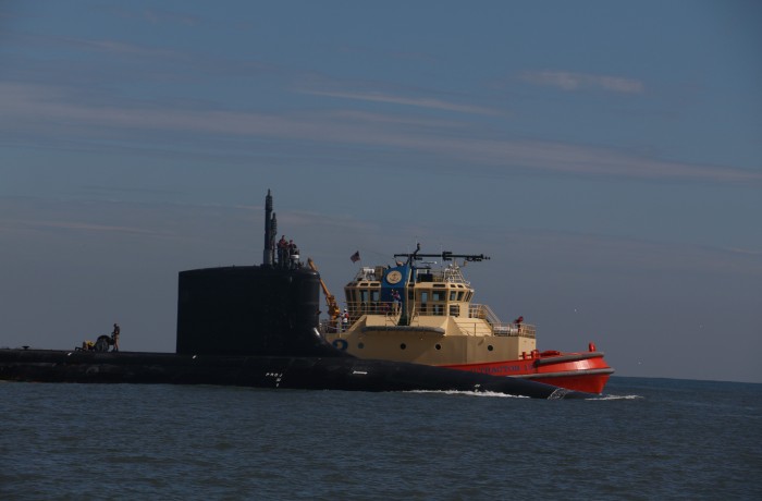 Navy submarine coming through Mayport Inlet