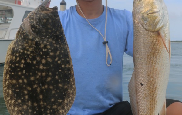Aj Rathbun with a Slab and an upper slot Red Fish