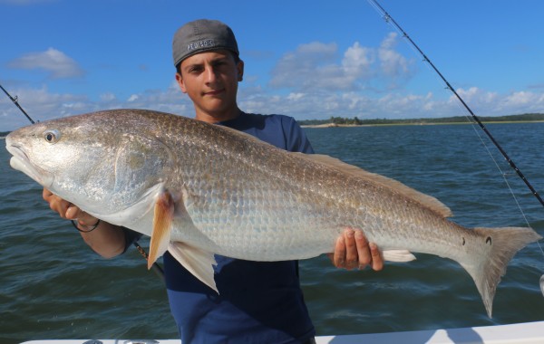 Aj Rathbun with a River Monster