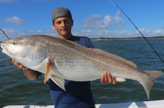 Aj Rathbun with a River Monster