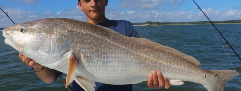 Aj Rathbun with a River Monster